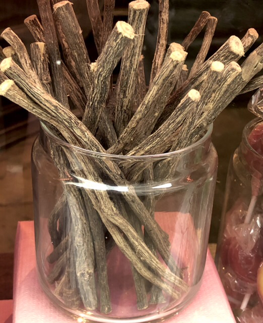 Image shows several Liquorice Roots in a jar