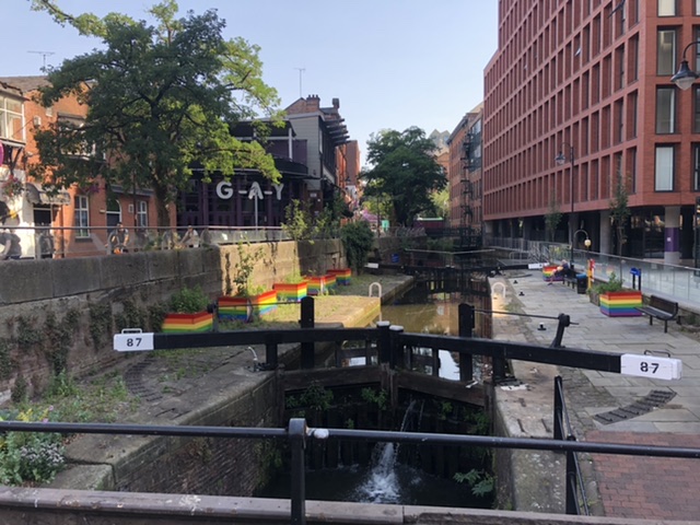 Image shows a canal lock at Canal Street Manchester